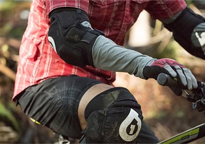 What safety gear is essential for mountain biking, and why?