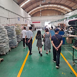 Vietnamese customers visit the production line at Panda Group bicycle factory